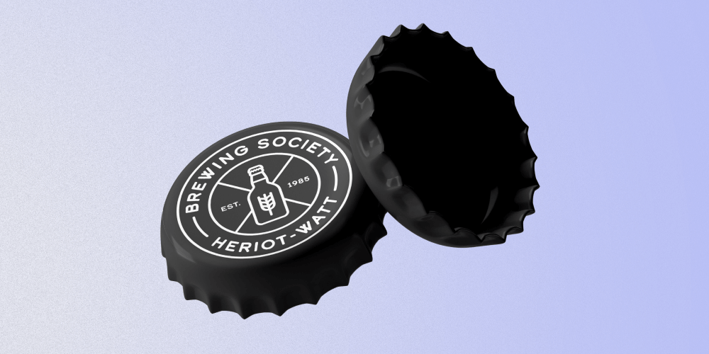 Image of 2 beer caps with the Heriot-Watt Brewing Society logo printed on the top