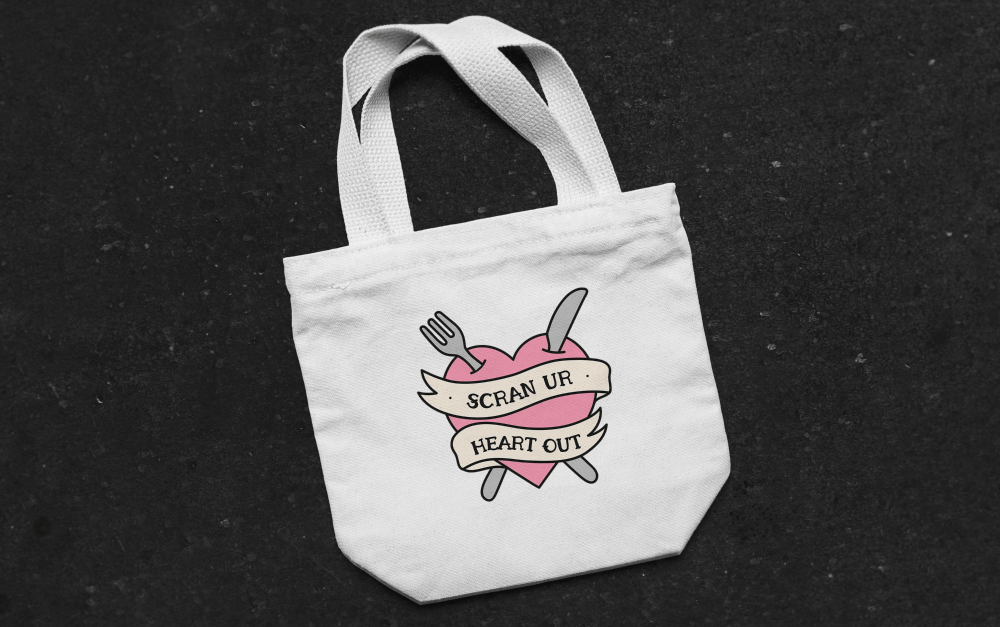 Image depicts Scran Ur Heart Out logo on a tote bag